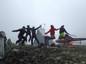 Kasey Aderhold and others at Alaska Transportable Array station.