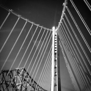 The new Oakland Bay Bridge, against the old, decommissioned one.