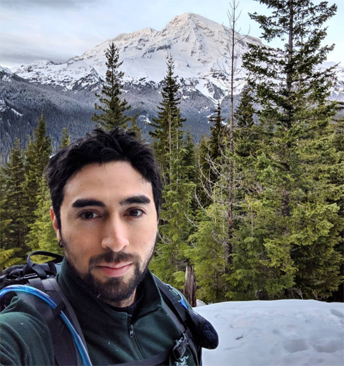 Matt Mendoza in front of Mt. Rainier.