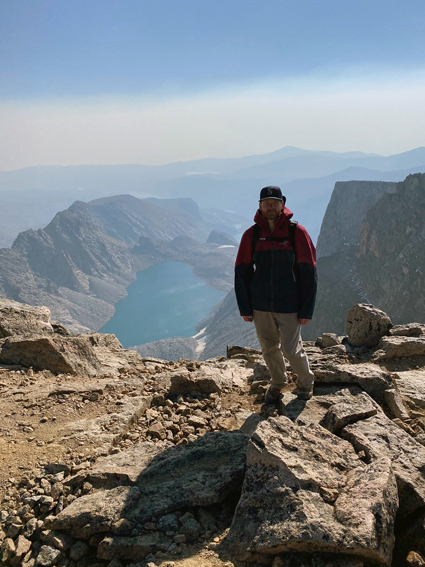 Kevin Ward standing on Cloud Peak in Bighorn Mountains in Wyoming.